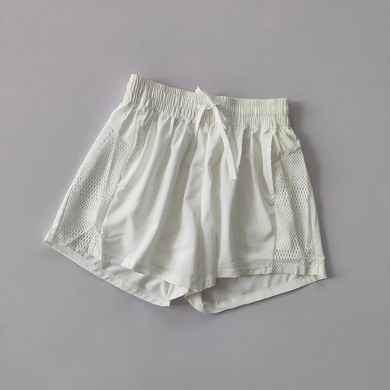 Women's Quick-Dry Sports Shorts – Loose Fit with Mesh Pockets